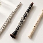 Flute, clarinet and recorder on a light table