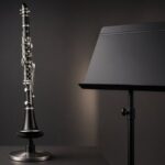 Black clarinet on a stand beside a music stand